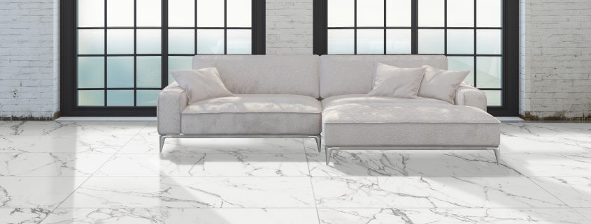 Bright airy minimalist modern attic conversion living room interior with a white sofa in front of large windows on a concrete floor. 3d rendering
