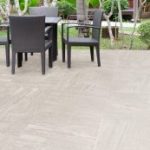 Table and chairs in front of the balcony